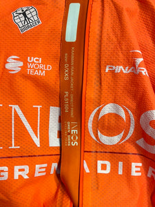 Team Ineos Grenadier | Bioracer Orange Kaaiman Rain Jacket As New